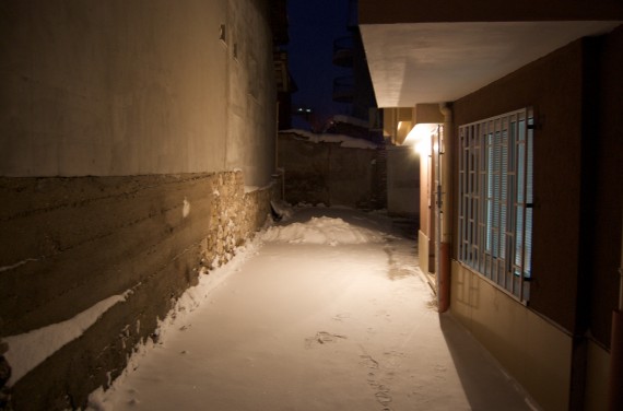 Snowy night alley